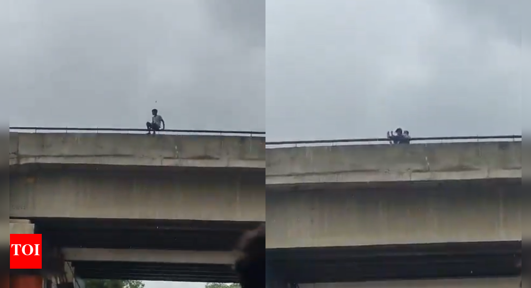 up-man-tries-to-jump-off-flyover-after-wife-refuses-to-return-home;-saved-by-cop