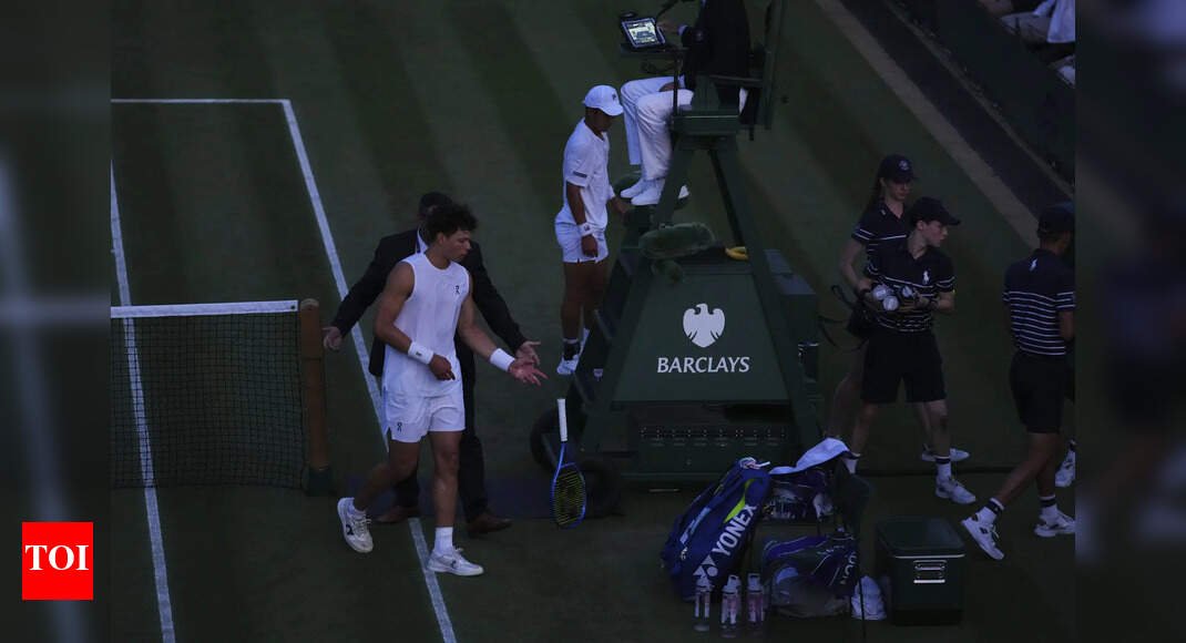 watch:-shelton-left-fuming-with-play-suspended-at-wimbledon-–-video