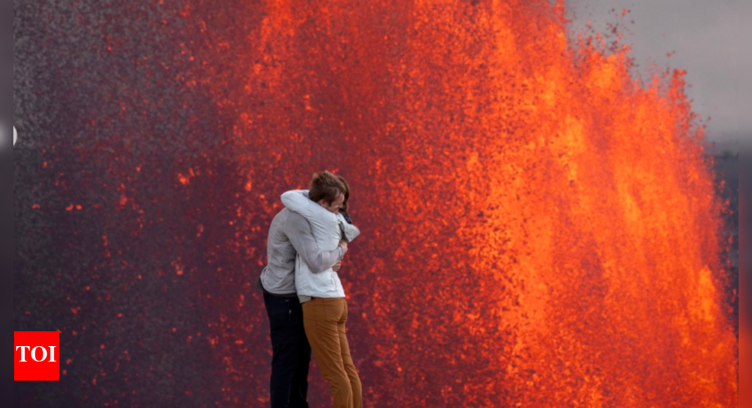 ‘lava-of-my-life’:-man-proposes-to-girlfriend-in-front-of-active-volcano,-pictures-go-viral