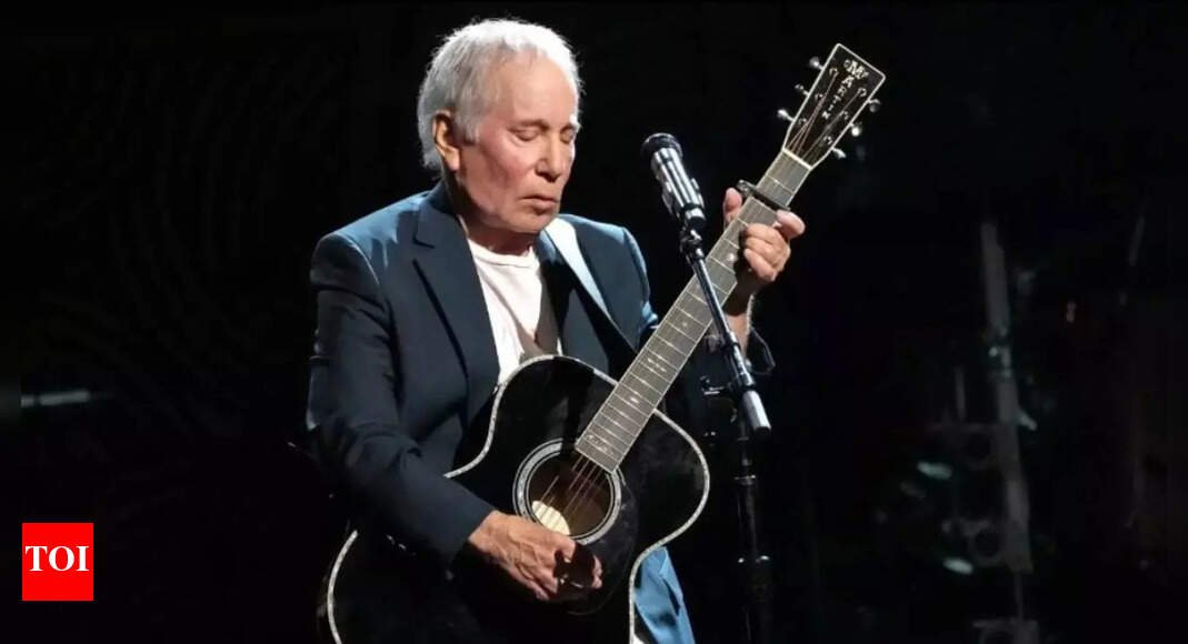 paul-simon-shares-health-update-after-back-surgery:-‘it-went-well,-as-expected’