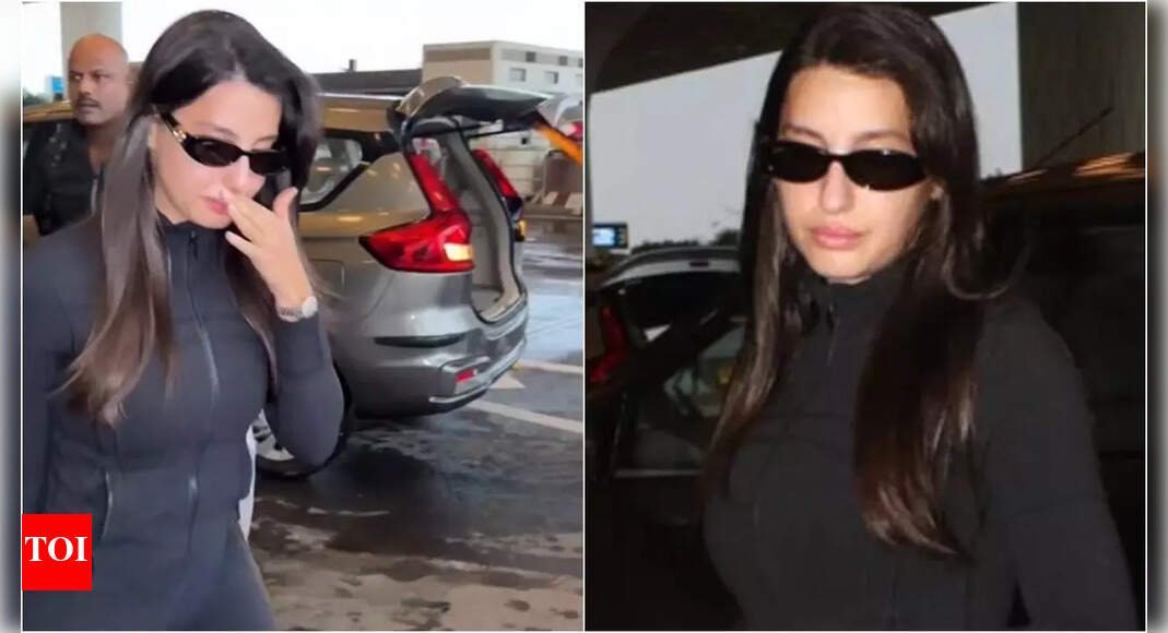 nora-fatehi-breaks-down-at-mumbai-airport,-her-bodyguard-pushes-away-fan-during-chaotic-moment-amid-cryptic-post-about-death