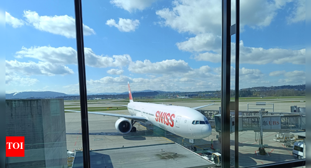 plane-on-runway,-incoming-swiss-flight-safely-executes-last-min-go-around-at-igia