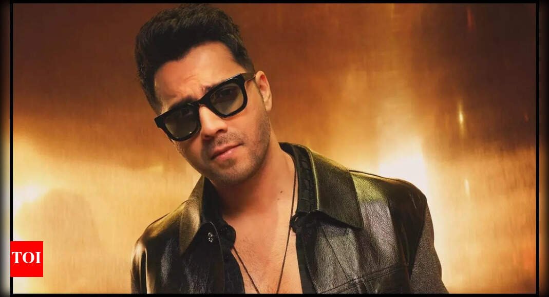 varun-dhawan’s-heartwarming-fan-encounter-at-the-airport:-‘border-2’-star-gives-his-sunglasses-to-the-fascinated-young-kid-–-watch