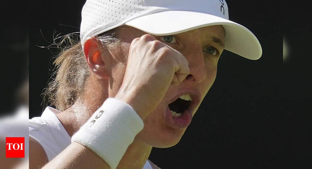 wimbledon:-swiatek-annihilates-anisimova-6-0,-6-0-to-clinch-first-grand-slam-title-on-grass