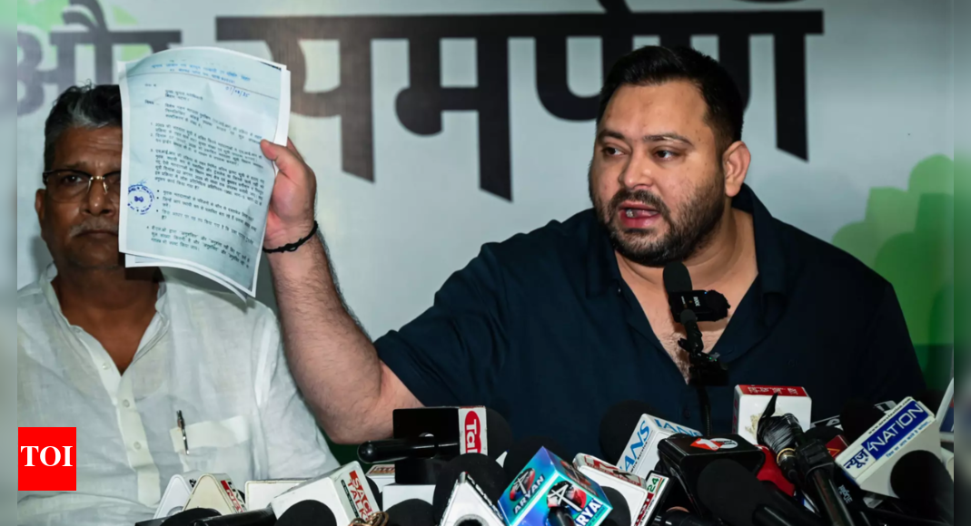 tejashwi’s-dual-voter-id-row:-ec-issues-notice-to-rjd-leader,-asks-him-to-hand-over-epic-card