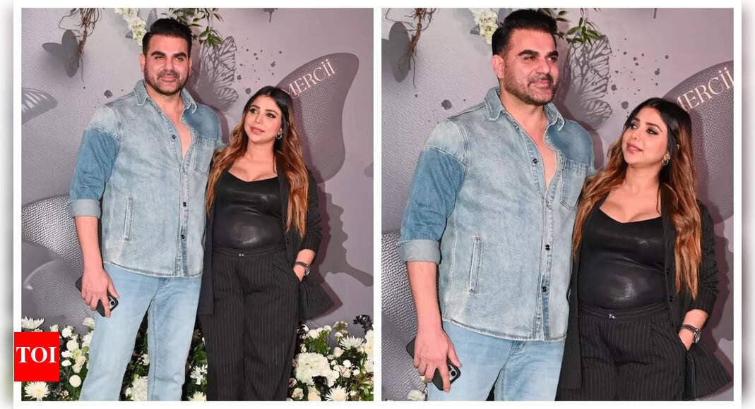 arbaaz-khan-is-all-smiles-as-pregnant-wife-sshura-khan-shows-off-her-baby-bump-at-his-birthday-celebrations-with-sister-arpita-khan-sharma-pic
