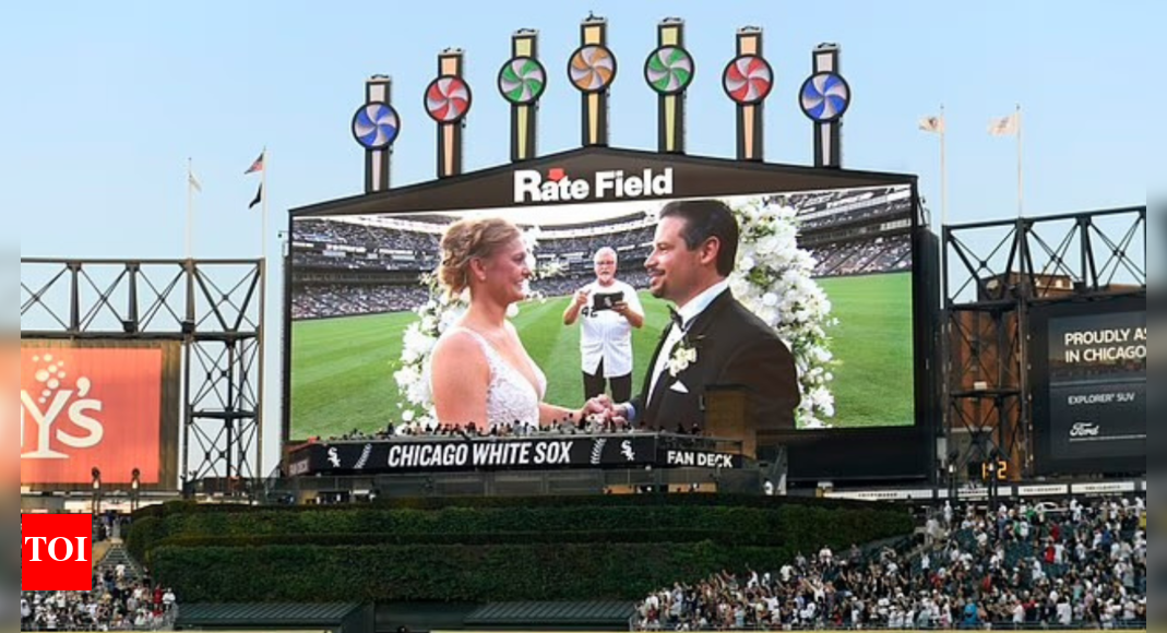 ron-kittle-leads-unforgettable-one-minute-wedding-for-white-sox-fans-during-fun-filled-night-with-a-50-foot-hot-dog