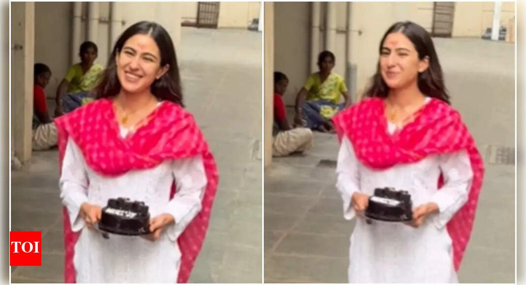 sara-ali-khan-celebrates-birthday-with-paparazzi,-cuts-cake-and-shares-joyful-moments-–-watch-video
