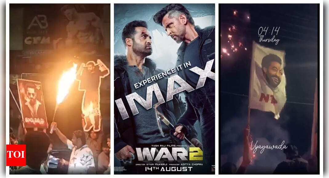 war-2:-jr-ntr-fans-celebrate-the-release-of-spy-film-costarring-hrithik-roshan;-burst-crackers-and-flares-at-4-am-outside-theatres-–-watch