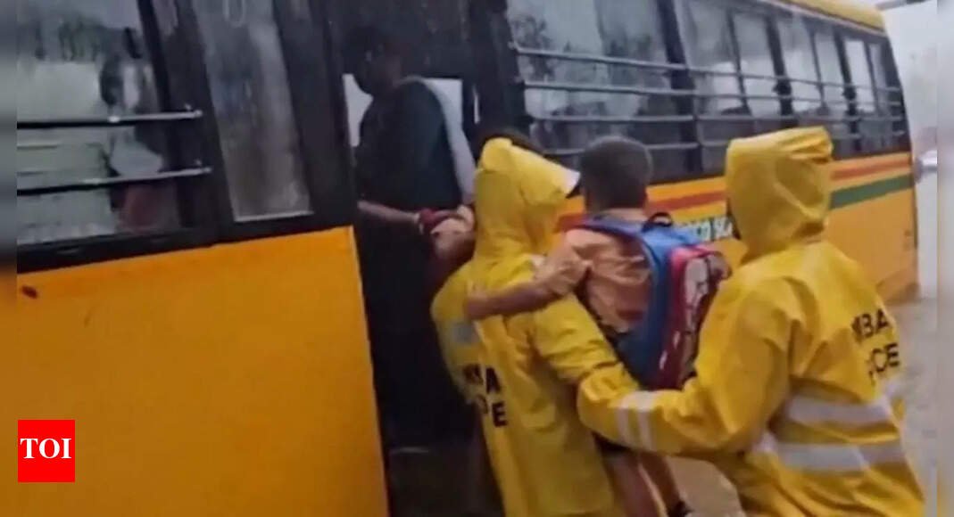 watch:-children-stuck-in-school-bus-on-flooded-mumbai-road;-rescued