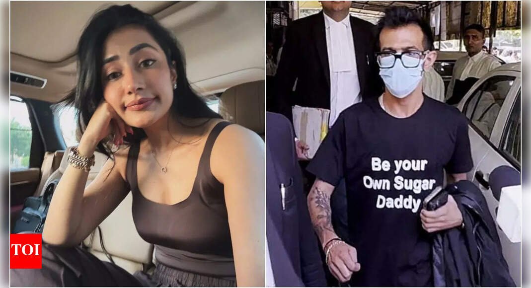 dhanashree-verma-reacts-to-yuzvendra-chahal’s-‘be-your-own-sugar-daddy’-t-shirt-at-divorce-hearing:-‘are-bhai,-whatsapp-kar-deta’