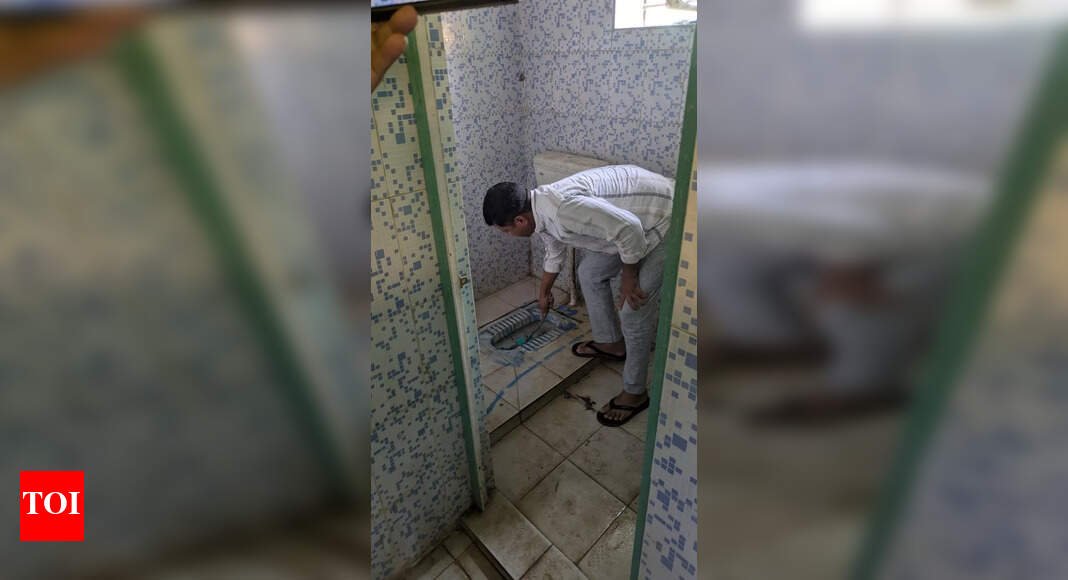 bjd’s-pradeep-majhi-protests-by-cleaning-dialysis-unit-toilet-in-nabarangpur