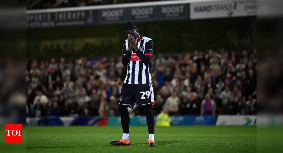 grimsby-town-punished-for-fielding-ineligible-player-vs-man-united;-will-they-be-expelled?