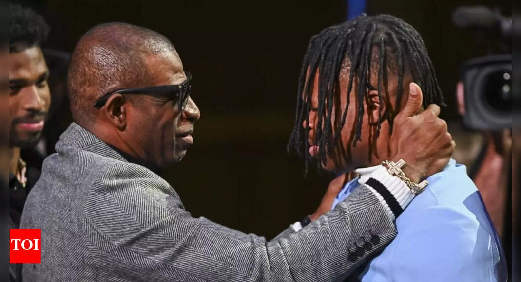travis-hunter-receives-heartfelt-fatherhood-advice-from-deion-sanders,-who-considers-the-jaguars-rookie-“like-a-son”