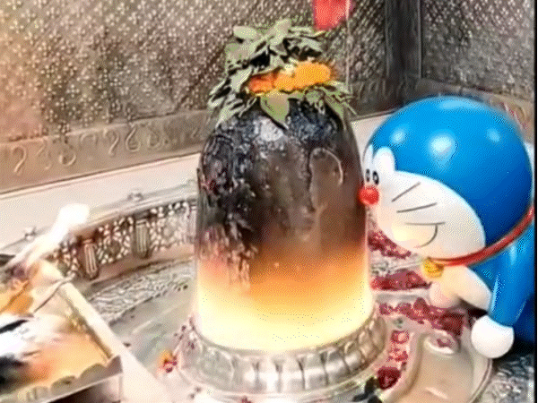 viral-cartoon-video-sparks-controversy-on-mahakal-temple:fir-registered-against-youth-who-created-ai-clip-showing-guard-with-doraemon-dancing-inside-‘garbh-grah’