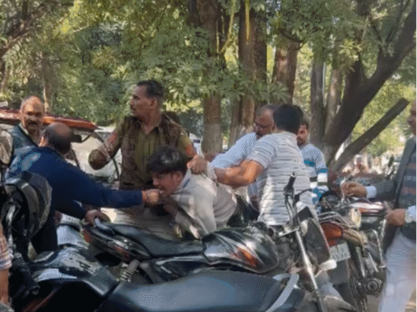 pharmacy-council-chief-assaults-youth-in-bhopal;-video-emerges:victim-alleges-being-locked-in-a-room;-eyewitnesses-claim-police-watched-without-intervening