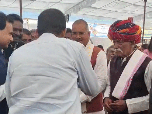 rajgarh-mp-touches-officials’-feet-in-protest-over-delay:’made-to-wait-like-a-fool-for-90-minutes’,-says-rodmal-nagar