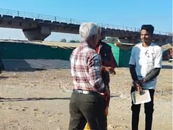 ias-officer-slaps-youth-at-narmada-bank:video-surfaces-showing-officer-threatening-priest,-saying-‘i-will-bury-you-in-the-sand’-after-spotting-urination