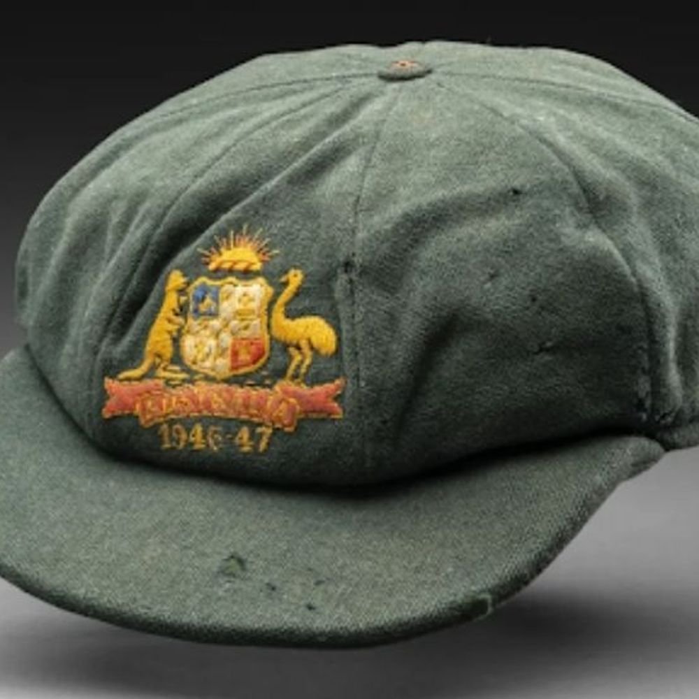 bradman’s-baggy-green-cap-auctioned-for-₹2.9-crore:australia-legend-worn-it-during-1st-tour-against-independent-india,-gifted-to-an-indian-bowler