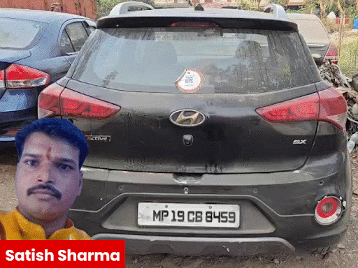 body-of-priest-discovered-in-locked-car-in-indore:shot-in-head,-pistol-found;-police-break-glass-to-recover-body,-investigation-underway