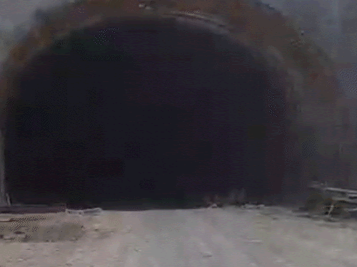 vehicles-passing-through-incomplete-tunnel-of-indore-ichhapur-highway-risking-lives:unpaved-road-and-darkness-prevails-inside-tunnel,-water-seeping-from-mountain