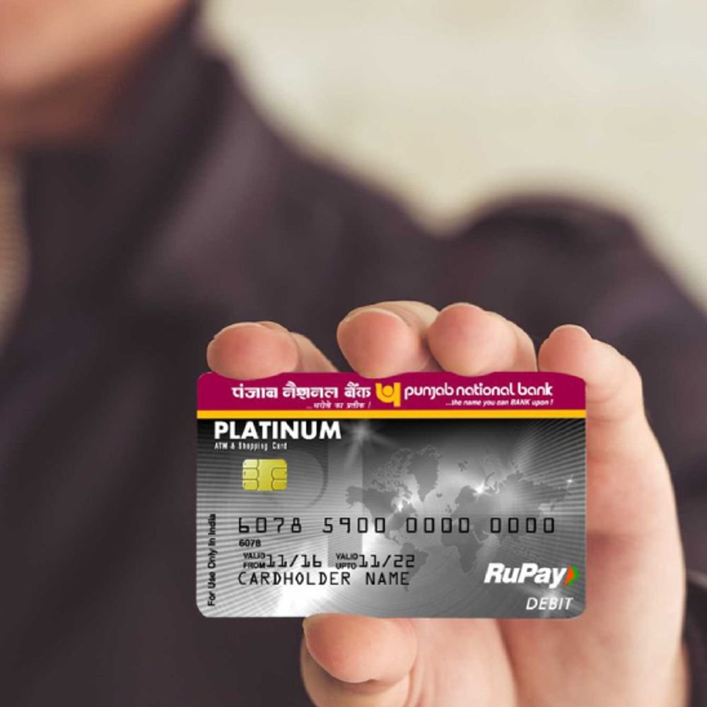pnb-reduces-daily-atm-cash-withdrawal-limit-to-₹50,000:lender-levies-cap-on-some-debit-cards;-users-can-change-limit-via-whatsapp