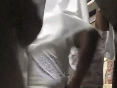 youths-film-reel-in-moving-train:wrapped-in-sheet,-block-passage-for-passengers,-booked