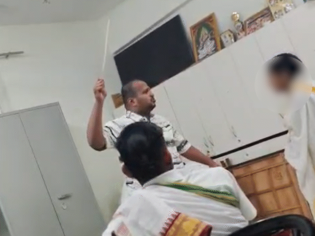 teacher-thrashes-student-with-stick,-screams-captured-on-video:minor-beaten-at-national-vedvidya-institute-in-ujjain-for-sleeping-on-another’s-bed