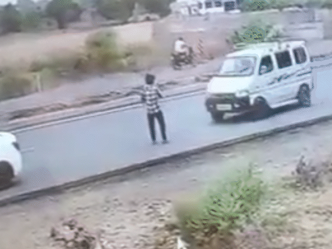 cctv-captures-brutal-highway-hit-and-run-incident:van-driver-ran-over-youth-twice,-victim-remains-critically-injured